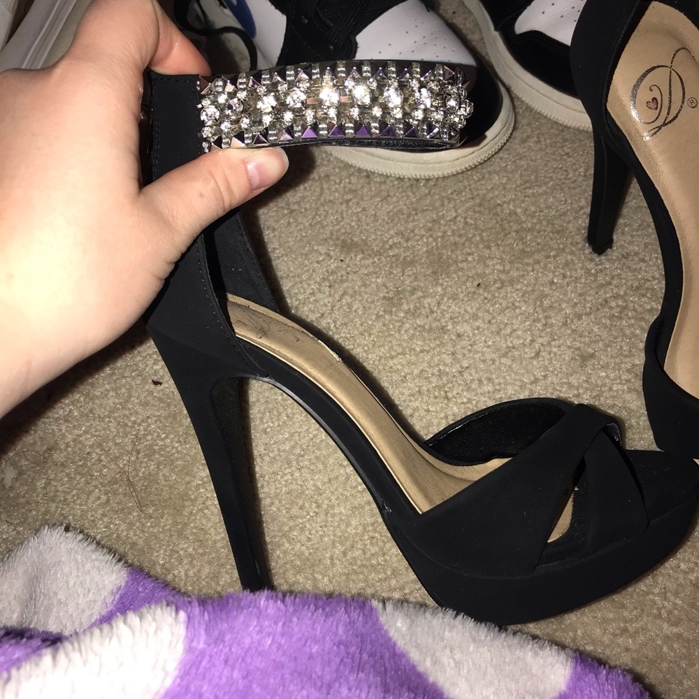 Black peep toe heels with a bedazzled ankle strap